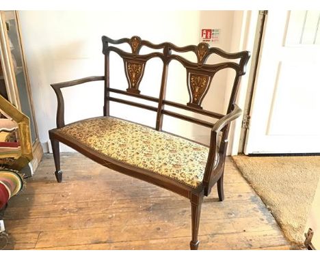 An Edwardian rosewood and inlaid two seater bedroom/drawing room sofa with pierced inlaid splat back and inset seat, with box