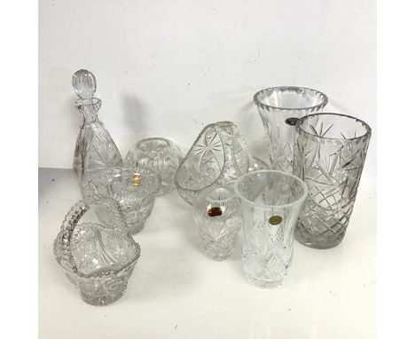 A collection of crystal including baskets, decanter and vases, some stamped Bohemia, Crystal de France and Doulton Internatio