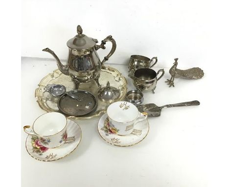 A mixed lot including an Epns table ornament Peacock (10cm x 16cm x 7cm), a salver, a teapot, milk jug, sugar bowl (a/), a si