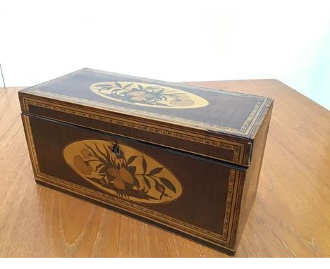 A 19thc mahogany and satinwood inlaid tea caddy, the rectangular top with floral oval panelled inlay and similar inlay to fro