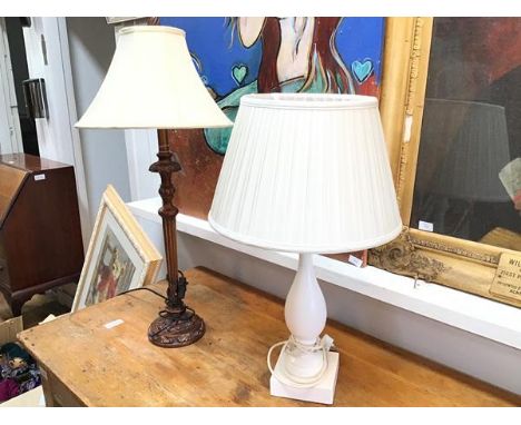 A modern white painted baluster vase lamp complete with pleated silk shade (h.67cm) and a bronzed finish moulded table lamp (