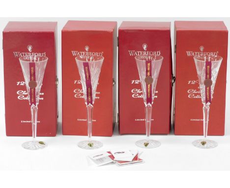 Four Waterford Crystal champagne flutes, The Twelve Days of Christmas Collection, limited edition, boxed.