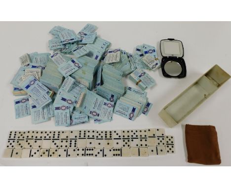 A set of Silk Cut advertising dominoes, a Super Kings plastic compact, and a box of Embassy cigarette vouchers.