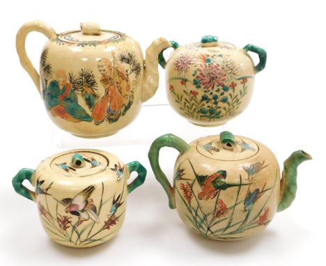 A Japanese Meiji period Satsuma three piece tea set, comprising teapot, sucrier and creamer, each with enamelled decoration o