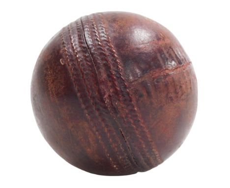 An early 20thC cricket ball, commemorating "Notts.v South Africans, Played at Nottingham, August 12, 13, 14, 1907, Notts, Won