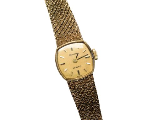 A Bulova lady's 9ct gold cased wristwatch, square champagne dial with batons, on a 9ct gold mesh bracelet strap, 22.7g all in