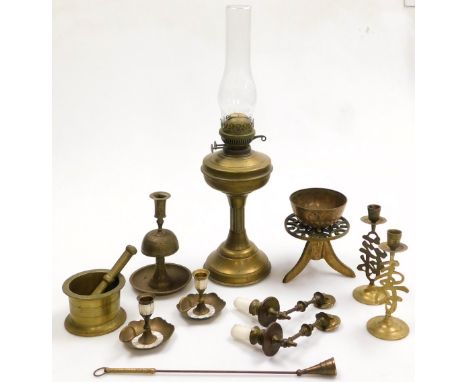 A brass pestle and mortar, Sherwood's brass oil lamp, with glass chimney, pair of Chinese brass candlesticks, and further bra