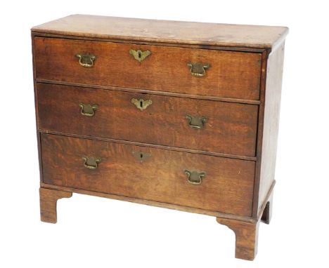A George III oak narrow chest, of three long graduated drawers, raised on bracket feet, 76cm high, 86cm wide, 38.5cm deep.