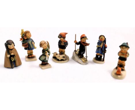 Seven Goebel Hummel figures, comprising Congratulations, 14cm high, Farm Boy, Hear Ye Hear Ye, together with angel holding a 