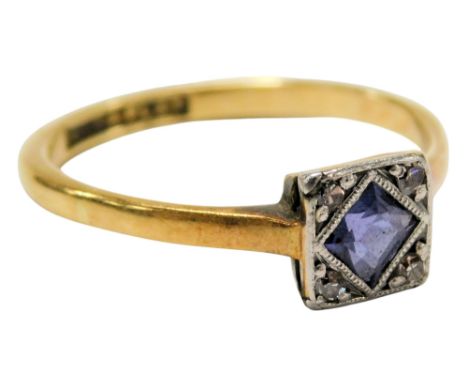 An Art Deco Sapphire and diamond ring, in a square table setting, yellow and white metal, stamped 18ct and plat, size O½, 2.6