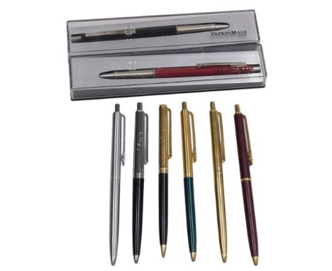 Eight Parker Papermate ball point pens, two boxed.