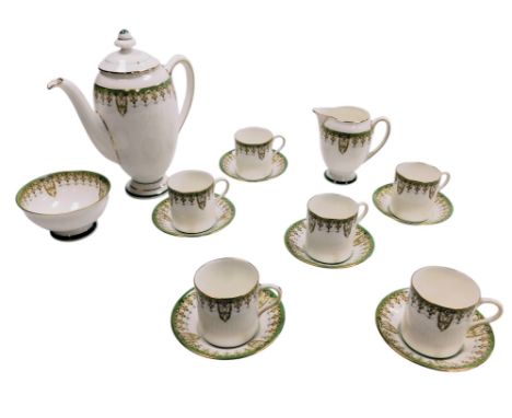 A Royal Doulton porcelain Tivoli pattern coffee service, comprising coffee pot, milk jug, sugar bowl, six coffee cups and sau