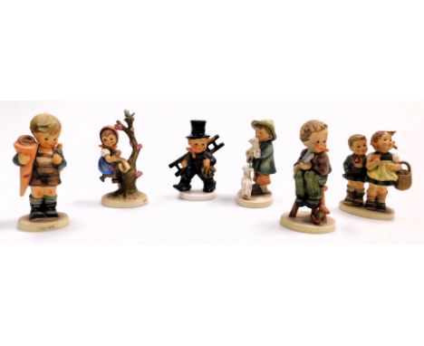 Six Goebel Hummel figures, comprising Little Tailor, 15cm high, Little Scholar, Apple Tree, To Market, together with boy hold