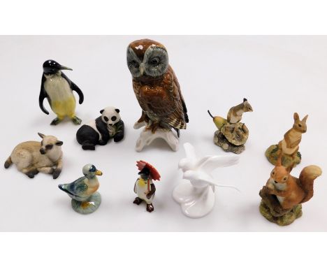 A group of Aynsley and other porcelain and pottery figures, to include an Aynsley red squirrel, 13cm high, and a Border Fine 