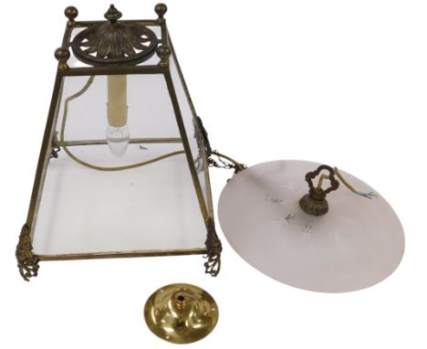 An early 20thC French brass hall lantern, with a frosted circular glass ceiling rose attachment, 38.5cm high.