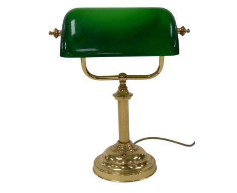 A brass desk lamp, with an angled green glass shade, 36.5cm high.
