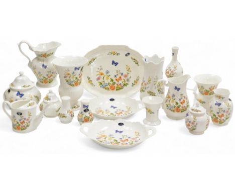 A group of Aynsley Cottage Garden pattern porcelain, including dishes, vases, jug, watering can, jars and covers, all boxed.