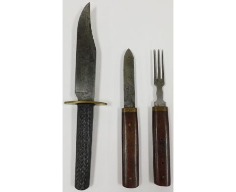 A World War II period military knife and fork set, the handles inscribed with the owner's initials and military serial number