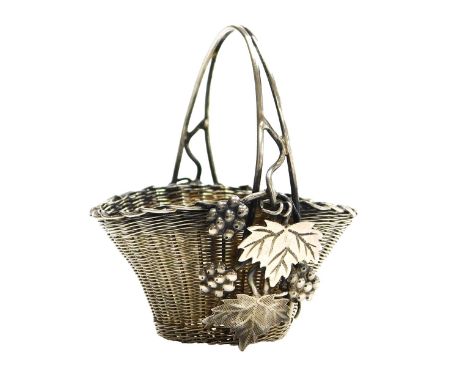 A Chinese silver basket with loop handle, applied with fruiting vines, signed to base, 5.5cm high.