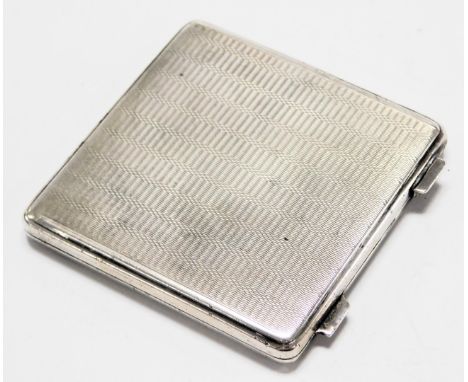 A George VI silver compact, with engine turned decoration, Birmingham 1945, 2.40oz all in.