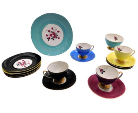 A 20thC Chodziez porcelain harlequin part tea service, printed with roses, comprising sugar bowl, bread plate, four teacups, 