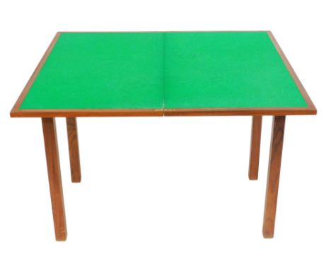 A mid Century Danish teak fold over card table, the rectangular top raised on square legs, bears impressed marks and numbers 