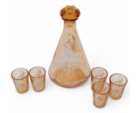 A Festival of Britain 1951 orange tinted glass decanter, of cylindrical, tapering from, with stopper, 19cm high, together wit