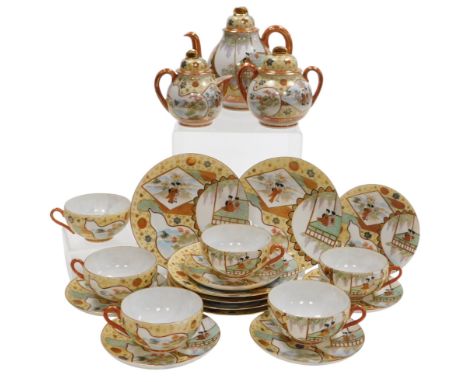 A Japanese eggshell porcelain part tea service, decorated with reserves of figures, on a yellow ground, comprising teapot, co