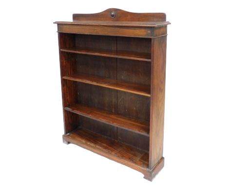 An early 20thC oak open bookcase, with a curved pediment over four shelves, raised on bracket feet, 128cm high, 99cm wide, 23