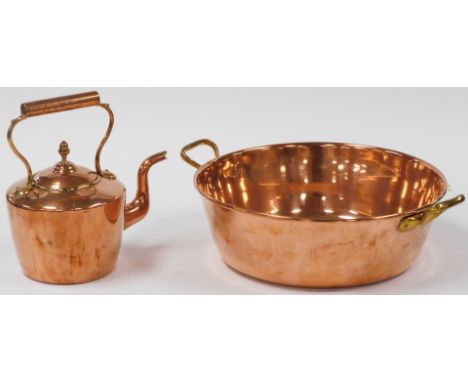 A Victorian copper and brass kettle, 28cm high, together with a copper preserve pan, with two brass handles, 38cm diameter.