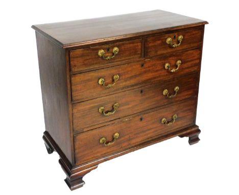 A George III mahogany chest, of two short over three long graduated drawers, raised on ogee bracket feet, 98cm high, 108cm wi