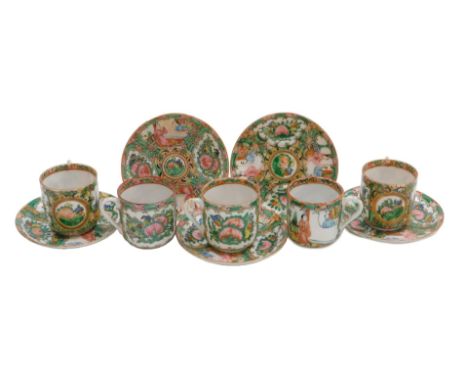 A set of five 20thC Chinese Canton porcelain teacups and saucers decorated in typical palette, the undersides with circular '