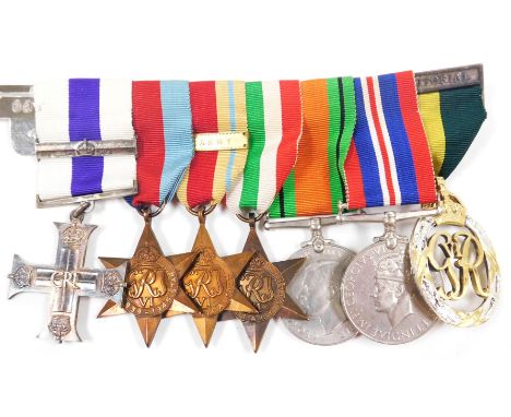 The exceptional WWII medal group awarded to Captain (Temp. Major) Reginald Edward Hawke (Buzzer) Hadingham, comprising MC and