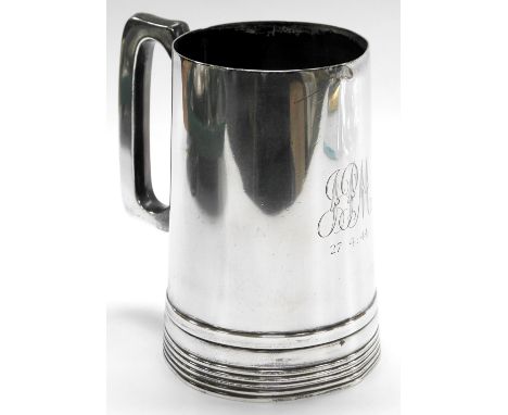 A George VI silver tankard, monogram engraved, and dated 27.4.44, Walker and Hall, Sheffield 1943, 14.06oz.