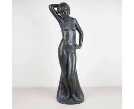 Graceful and striking in form, this limited edition Lladro porcelain figurine titled Pose S.L. captures a nude woman standing
