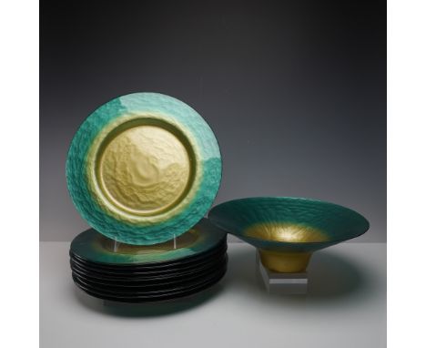 This striking 11-piece set by Portmeirion Studio Glass includes ten charger plates and one wide serving bowl, all crafted in 