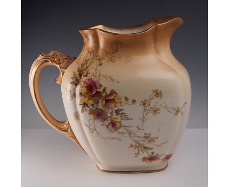 This elegant 10.5-inch water jug by Doulton Burslem features a refined bulbous form adorned with soft blush shading and delic