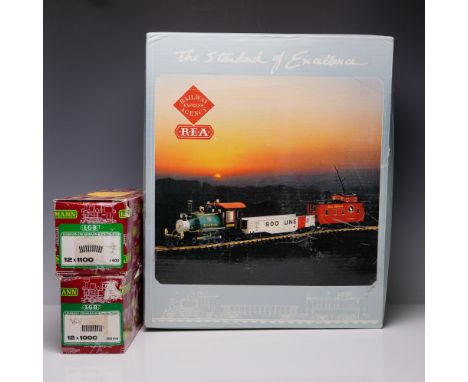 REA (Railway Express Agency) G scale Great Northern freight train set including a steam locomotive marked "Gen. Song," red ca