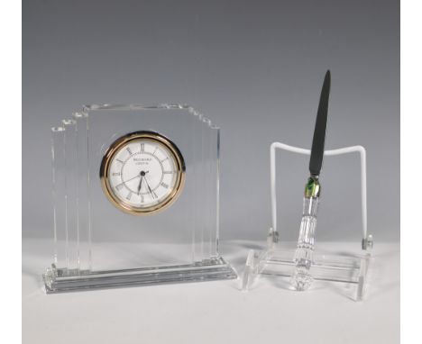 This 2-piece Waterford Crystal set includes an elegant clock and a refined letter opener, both showcasing Waterford's renowne