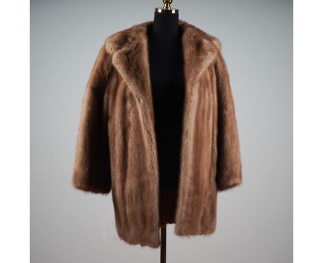 This vintage brown mink fur coat by Sperry Furs of Fort Dodge exudes refined mid-century glamour with its soft, full-bodied p