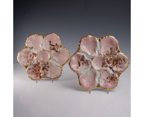 A refined pair of antique French porcelain oyster plates by Haviland &amp; Co., Limoges, each crafted in a delicate six-lobed