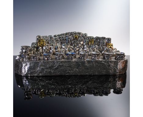 This sculptural silver menorah is a striking and substantial work by D'Argenta, the renowned Mexican design house known for i