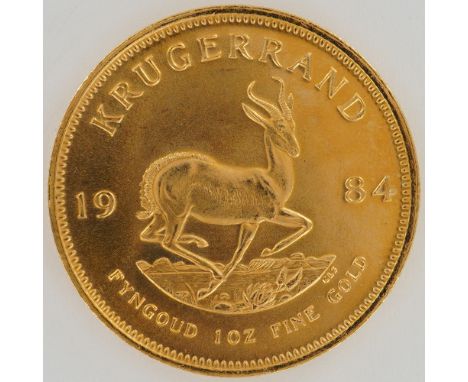 This 1984 South African gold coin contains one troy ounce of fine gold. The obverse shows a left-facing portrait of Paul Krug