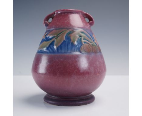 This Roseville Pottery vase is a fine example of the Baneda pattern, introduced in the 1930s. It features a bulbous lower bod