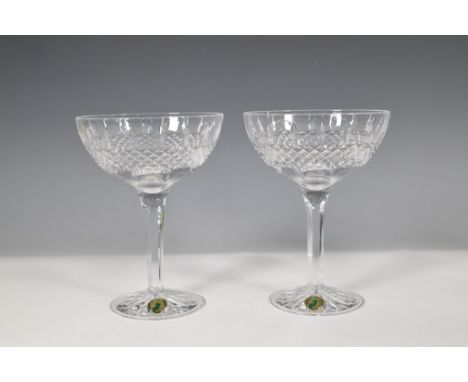 A pair of Waterford crystal margarita glasses in the Glenmede pattern, featuring intricate diamond and wedge cuts. Each glass