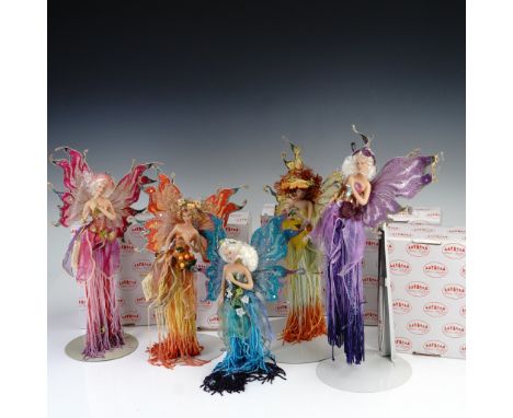 This 5-piece set features Show Stoppers Magical Night Light fairy figures, each with vibrant wired wings, hand-painted porcel
