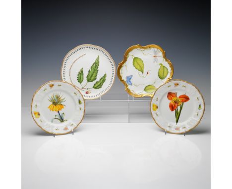 A stunning collection of four Anna Weatherley Designs porcelain plates, each masterfully hand painted in Hungary. Featuring v