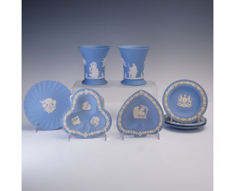 An attractive mixed group of eight iconic Wedgwood Jasperware pieces in the brand's signature blue matte bisque stoneware wit