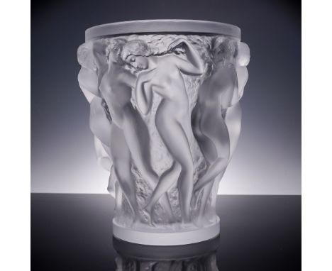 This exquisite Lalique crystal Bacchantes vase features an iconic design of nude female figures in high relief, a masterpiece