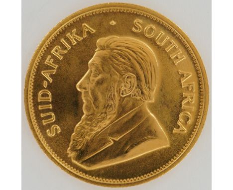 1983 South African 1 oz Gold Krugerrand coin enclosed in a sealed protective slab. The obverse features a left-facing image o